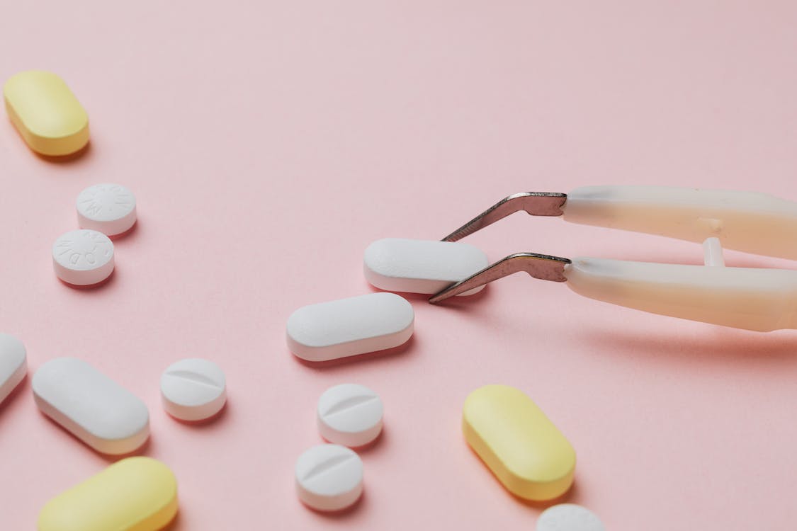 Free Close-Up Photo Of Tablets Stock Photo